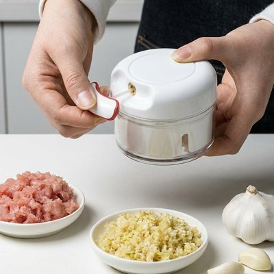 Mini hachoir manuel compact et ergonomique: